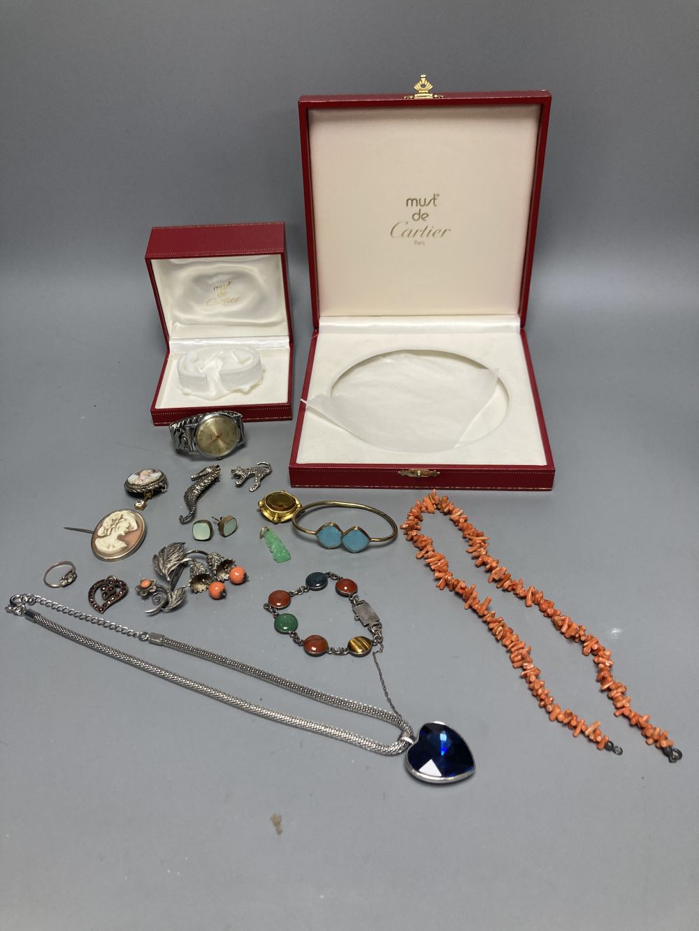 Two Must de Cartier jewellery boxes and a small quantity of jewellery including costume and a Timex watch.